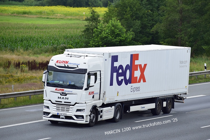 _DSC9447 KUHN INTERNATIONAL-crop-MAN TGX II - KRONE - FEDEX.JPG